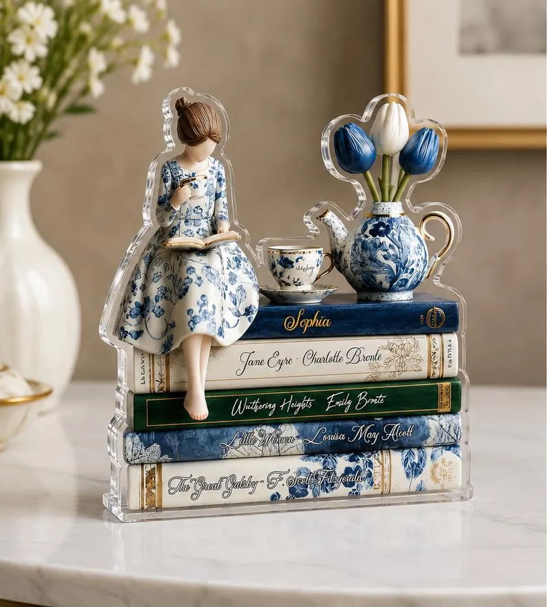 Book stack with figurine — pristine staged photo